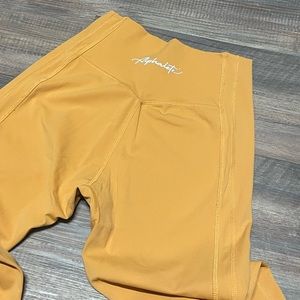 Alphalete Pulse Kinetic Leggings in “Sun Kissed” Size Small